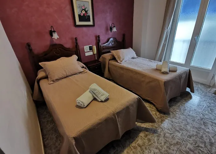 Dona Carmen Hotell *